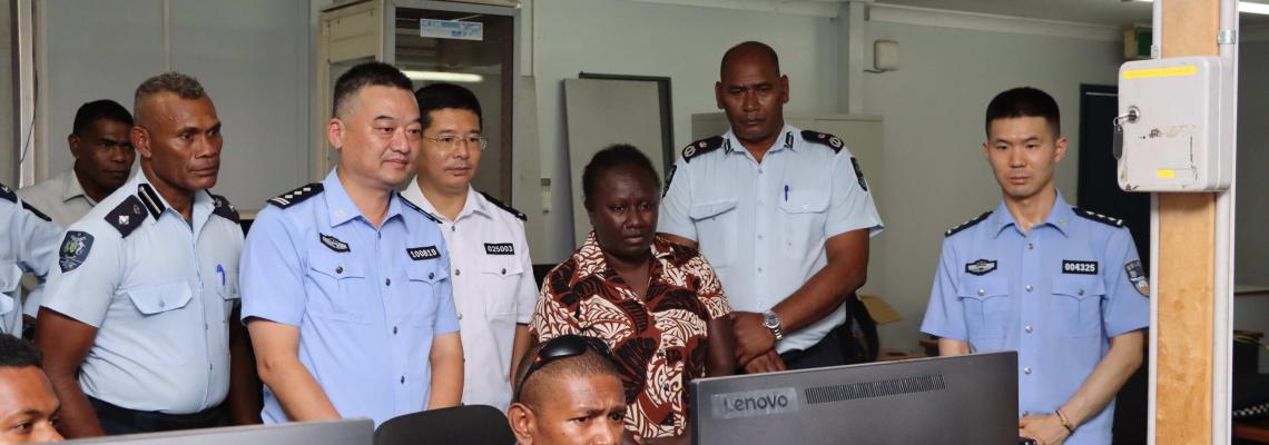 Commissioner Mangau, PS Karen Galokale and Commissioner Zhang watch during the  joint mock exercise